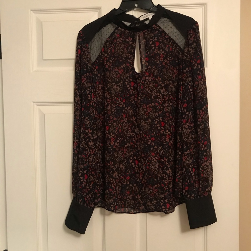 Floral blouse. Sheer.